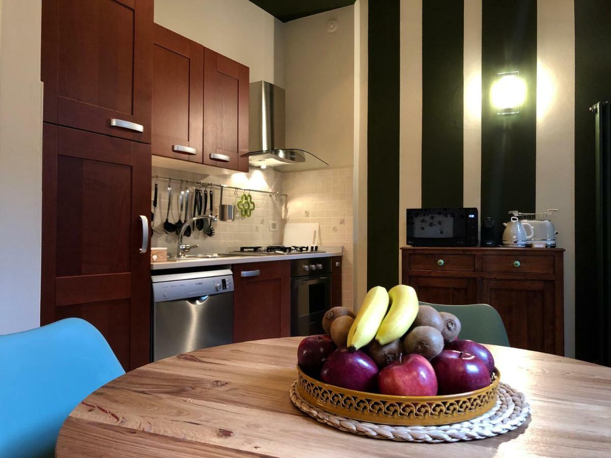 La Via Degli Artisti Apartment Arona Bagian luar foto